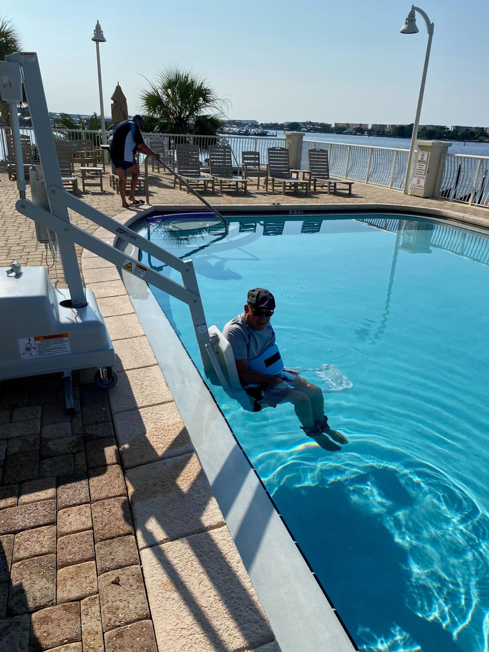 Jim Schaus was able to buy and install a pool lift at his Fort Walton Beach condo after help from the Center for Independent Living in Pensaocla.