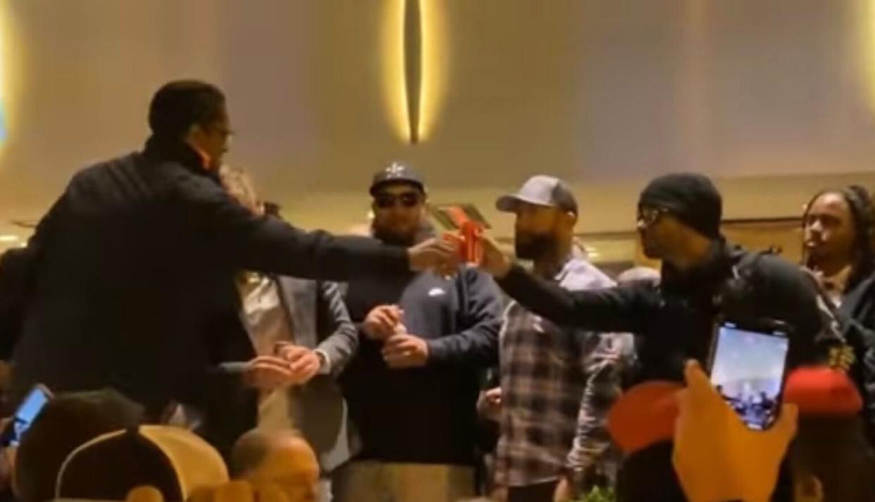 Ali Alexander and Proud Boys leader Enrique Tarrio toast in November 2020, after a Stop the Steal rally in Washington. (Photo: <a href="https://www.cjtv.live/" target="_blank">CJ Halliburton</a>)