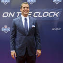 Central Florida quarterback Blake Bortles poses for photos upon arriving for the 2014 NFL Draft at Radio City Music Hall, Thursday, May 8, 2014, in New York. (AP Photo/Craig Ruttle)