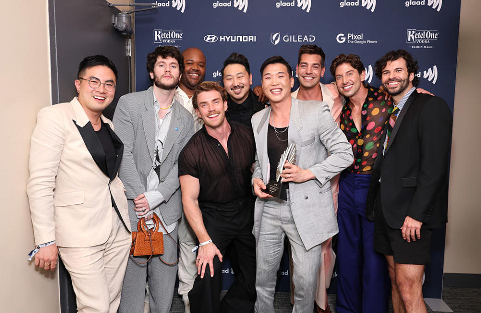 Honoree Joel Kim Booster and guests celebrate during the 34th Annual GLAAD Media Awards at New York Hilton on May 13, 2023 in New York City.