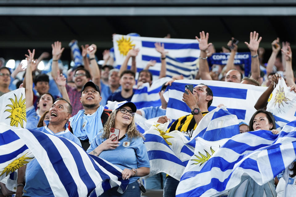 Fans of Uruguay cheer on the team before the start of a Copa America Group C soccer match against Bolivia in East Rutherford, N.J., Thursday, June 27, 2024. (AP Photo/Julia Nikhinson)