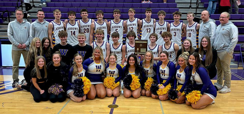 Watertown High School's players, coaches, student managers and players pose after the Arrows topped Sioux Falls Lincoln 31-28 in a Class AA SoDak 16 state-qualifying boys basketball game on Saturday, March 2, 2024 in the Watertown Civic Arena.