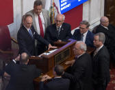 West Virginia Senate president, Mitch Carmichael, middle left, presides over a bench conference in the Senate chambers during the pre-trial impeachment conference in the West Virginia State Senate chambers at the Capitol in Charleston, W.Va., Tuesday, Sept. 11, 2018. (AP Photo/Steve Helber)