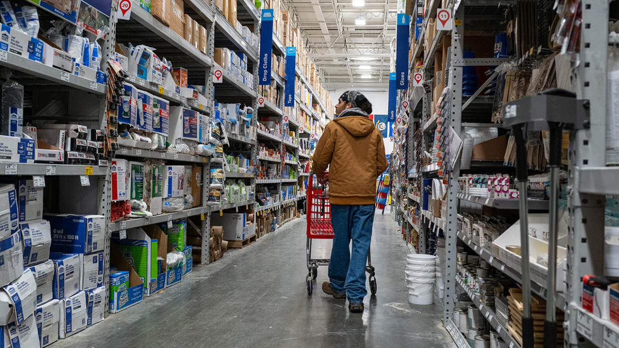 Consumers shop at a home improvement store