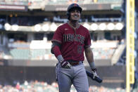 Arizona Diamondbacks' Josh Rojas walks to the dugout after striking out against the San Francisco Giants during the 10th inning of a baseball game in San Francisco, Sunday, Oct. 2, 2022. (AP Photo/Jeff Chiu)