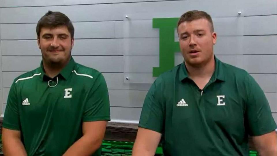PHOTO: Brian Dooley, right, gave his college football scholarship to his teammate, Zack Conti, at Eastern Michigan University. (EMU Athletics)