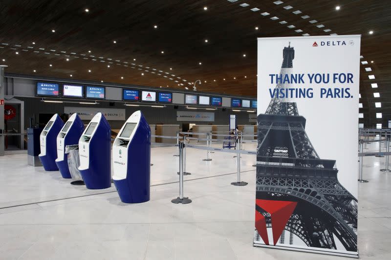 FILE PHOTO: American airlines company Delta registration desks are deserted at Paris Charles de Gaulle airport