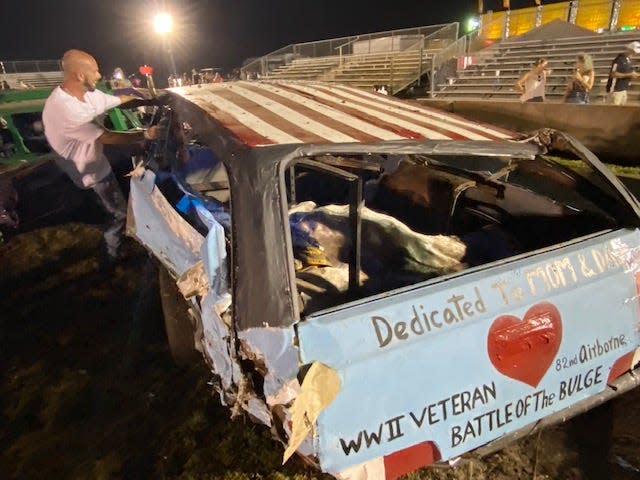 Pop's Wagon took a beating in the St. Lucie County Fair's demolition derby Saturday, but driver Matt Britcher was able to restart the vehicle and drive it out of the arena, which not many competitors could manage.