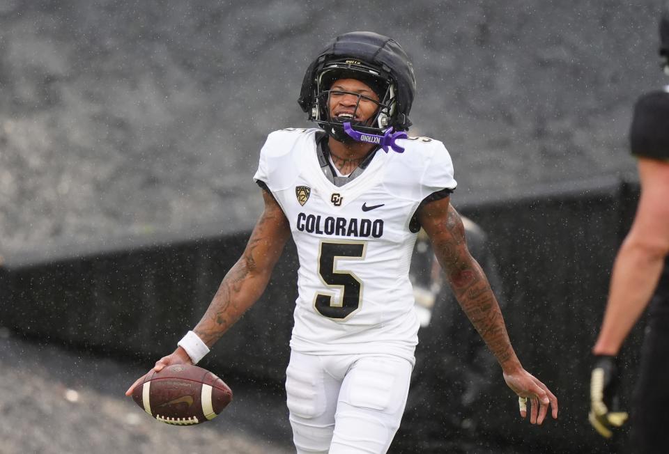 April 27, 2024; Boulder, CO, USA; Colorado Buffaloes wide receiver Jimmy Horn Jr. (5) celebrates his kickoff return during a spring event at Folsom Field. Mandatory Credit: Ron Chenoy-USA TODAY Sports