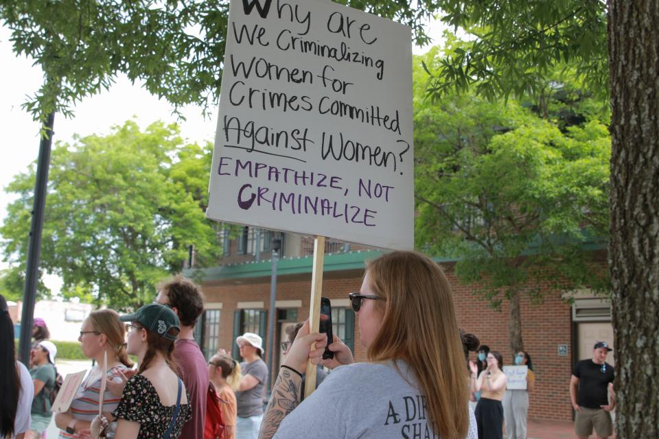 Hollie Fleischman holds a sign during the Reproductive Rights Protesting, Augusta rally Saturday, May 21, 2022, in Augusta, Ga.