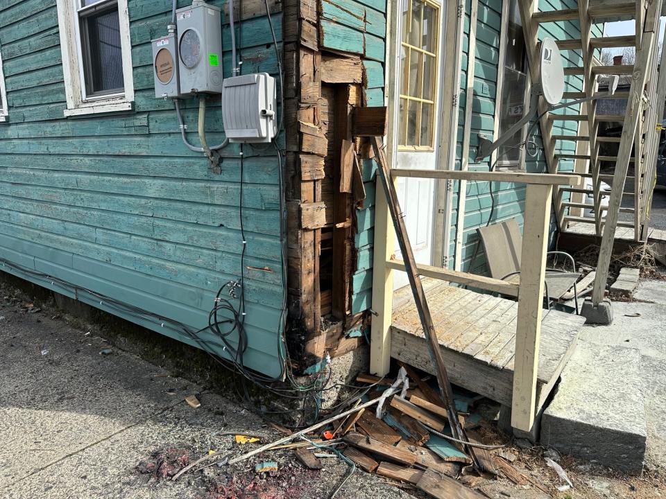 A corner of a building at the intersection of McConnell Street and North 3rd Street in Stroudsburg caught fire as a result of a downed wire during an accident on Tuesday, Feb. 6, 2024.