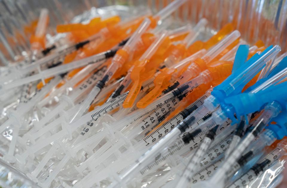 Syringes full of the Pfizer vaccine are ready to go at Oakland University.