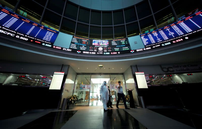 FILE PHOTO: Bahraini traders are pictured in Bahrain Bourse in Manama, Bahrain