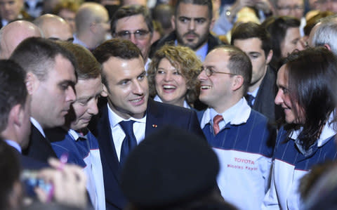 The French president visited the Toyota factory - Credit: FRANCOIS LO PRESTI/AFP/Getty Images