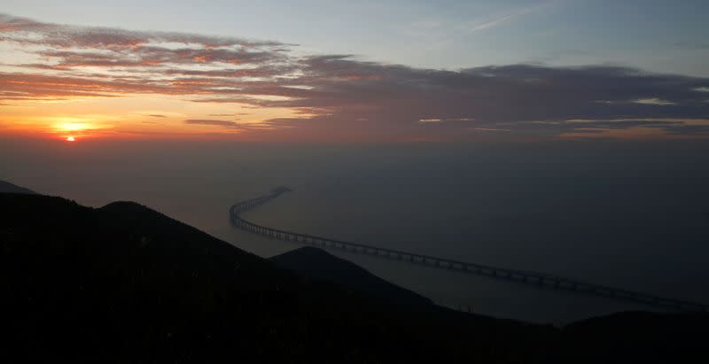 A sunset view of the Hong Kong-Zhuhai-Macau bridge off Lantau island in Hong Kong