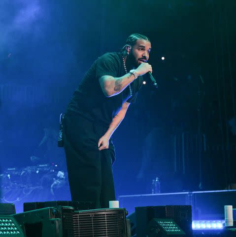 <p>Prince Williams/Wireimage</p> Rapper Drake performs onstage during "Lil Baby & Friends Birthday Celebration Concert" at State Farm Arena on December 9, 2022