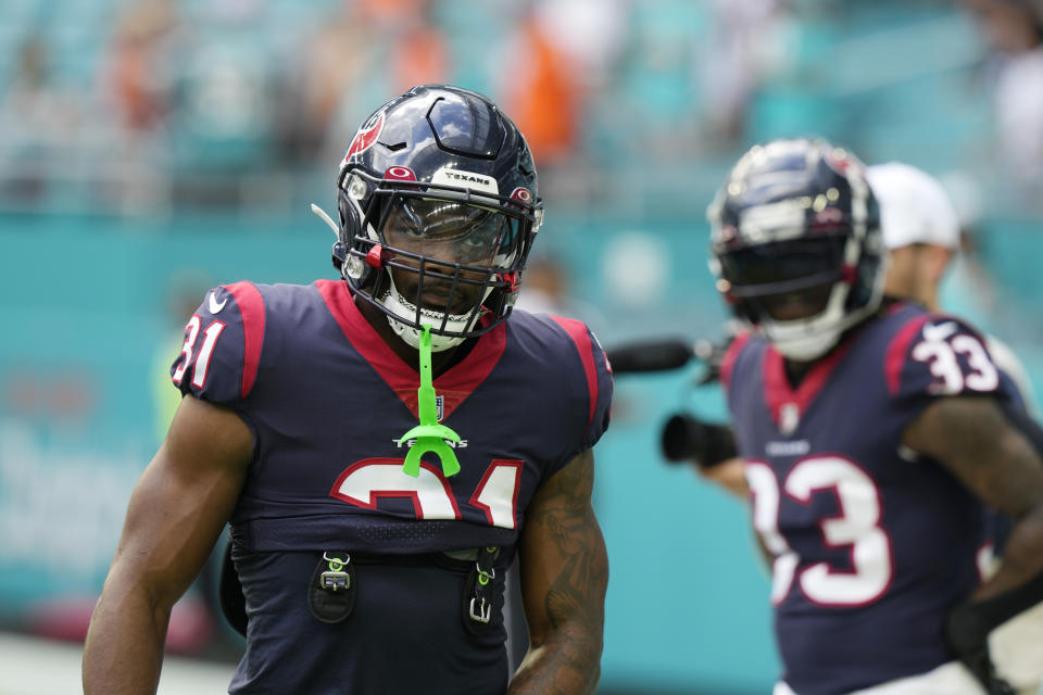 Houston Texans running back Dameon Pierce (31) warms up before an NFL football game against the Miami Dolphins, Sunday, Nov. 27, 2022, in Miami Gardens, Fla. (AP Photo/Lynne Sladky)