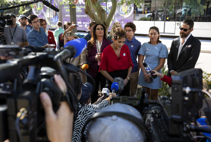 Republican gubernatorial candidate Kari Lake speaks to reporters after voting with her family on Election Day in downtown Phoenix, Ariz. on Tuesday, Nov. 8, 2022. (Alisha Jucevic/The New York Times)