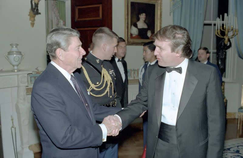 President Reagan shakes hands with Donald Trump at a reception at the White House in 1987. (Photo: Ronald Reagan Presidential Library & Museum/Zuma Press)