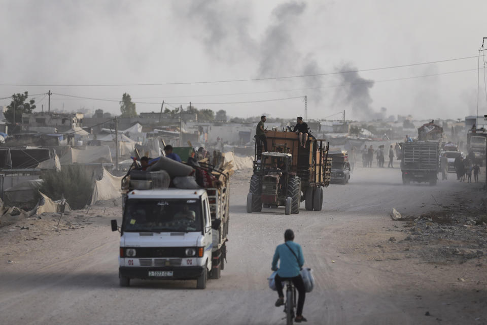 Palestinians fleeing from the southern Gaza city of Rafah during an Israeli ground and air offensive in the city on Tuesday, May 28, 2024. (AP Photo/Jehad Alshrafi)