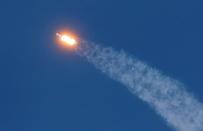 FILE PHOTO: A SpaceX Falcon 9 rocket lifts off from pad 39A with the seventh batch of SpaceX broadband network satellites, at the Kennedy Space Center, in Cape Canaveral