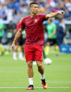 <p>Portugal’s Cristiano Ronaldo surrounded by moths as he warms up prior to the UEFA Euro 2016 match. </p>