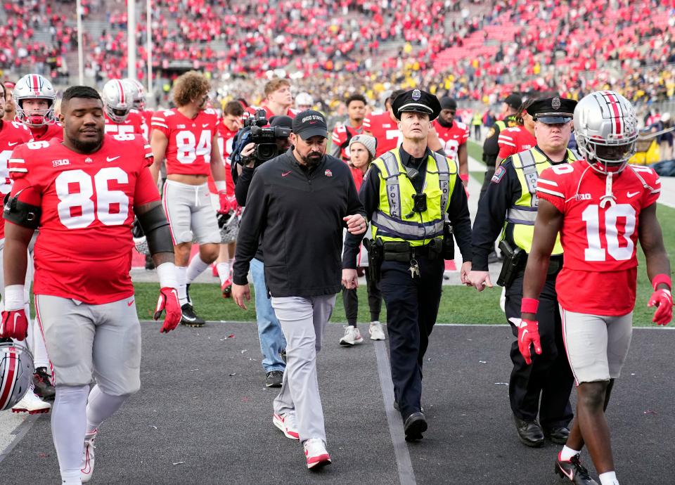 Nov 26, 2022; Columbus, OH, USA; Ohio State Buckeyes head coach Ryan Day walks off the field after losing to the Michigan Wolverines 45-23 at Ohio Stadium. 