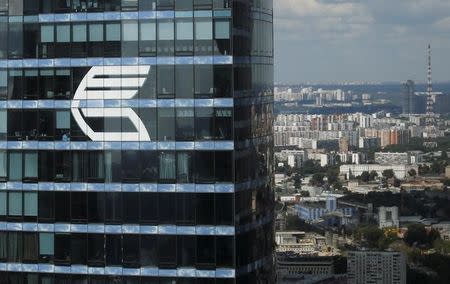 The logo of VTB Group is seen through a window of Imperia Tower on a facade of the Federatsiya (Federation) Tower at the Moscow International Business Center also known as "Moskva-City", in Moscow, Russia, August 5, 2015. REUTERS/Maxim Zmeyev/File Photo