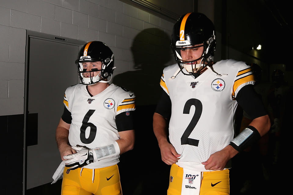 GLENDALE, ARIZONA - DECEMBER 08: Quarterbacks Devlin Hodges #6 and Mason Rudolph #2 of the Pittsburgh Steelers walk out onto the field before the NFL game against the Arizona Cardinals at State Farm Stadium on December 08, 2019 in Glendale, Arizona. (Photo by Christian Petersen/Getty Images)