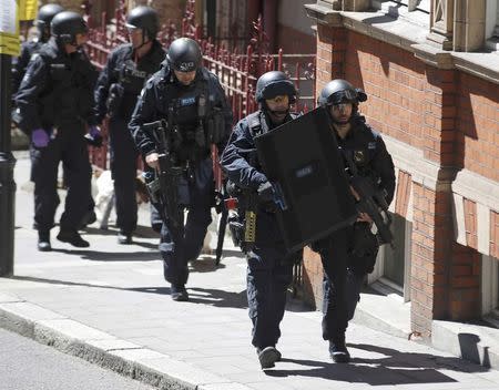 London Metropolitan Police take part in Exercise Strong Tower, removing actors as casualties from the scene of a mock terror attack at a disused underground station in central London, Britain June 30, 2015. REUTERS/Peter Nicholls