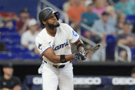 Miami Marlins' Bryan De La Cruz hits a home run during the sixth inning of a baseball game against the San Francisco Giants, Wednesday, April 17, 2024, in Miami. (AP Photo/Marta Lavandier)