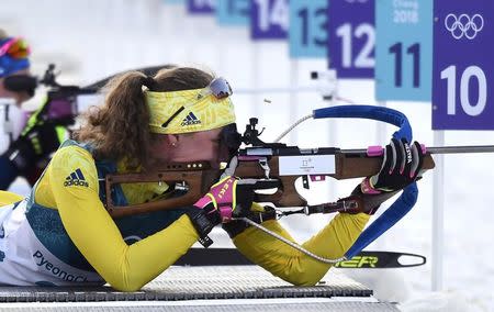 Biathlon - Pyeongchang 2018 Winter Olympics - Women's 15km Individual Final - Alpensia Biathlon Centre - Pyeongchang, South Korea - February 15, 2018 - Hanna Oeberg of Sweden shoots. REUTERS/Toby Melville