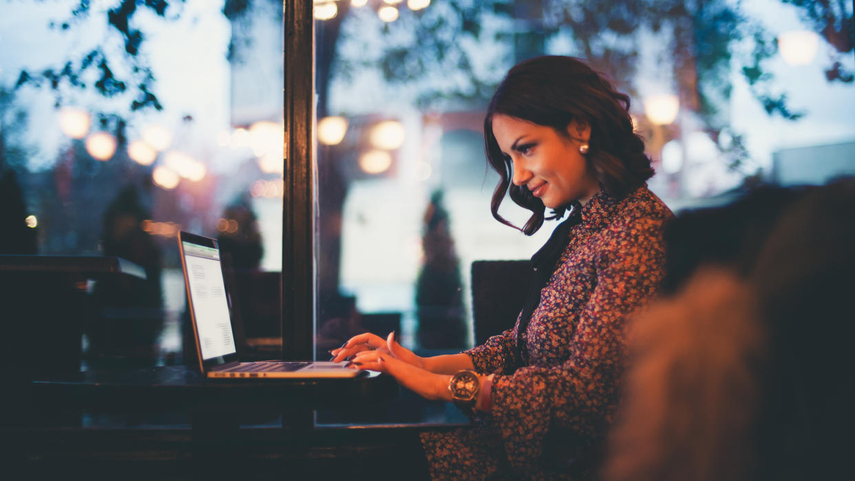 Working in a café.