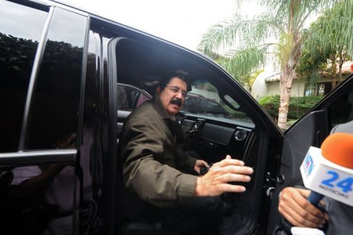 Honduran former President Manuel Zelaya Rosales, seen here outside his house in Tegucigalpa, in June, on the second anniversary of the coup d'etat that deposed him. Zelaya was deposed in a 2009 coup and not removed from the presidency in a "constitutional succession" as his opponents claimed, the Honduras Truth and Reconciliation Commission concluded on Thursday