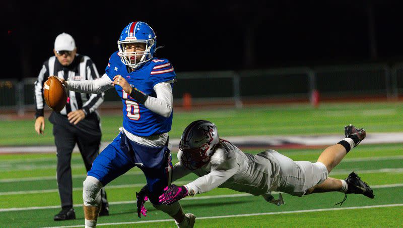 Manti High School’s Lincoln Alder attempts to tackle Richfield High School’s Reggie Hafen during the 3A football state championship at Southern Utah University in Cedar City on Saturday, Nov. 11, 2023.