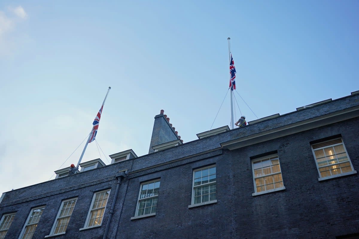 Flags above No 10 Downing Street fly at half mast following the announcement of the Queen’s death (Dominic Lipinski/PA) (PA Wire)