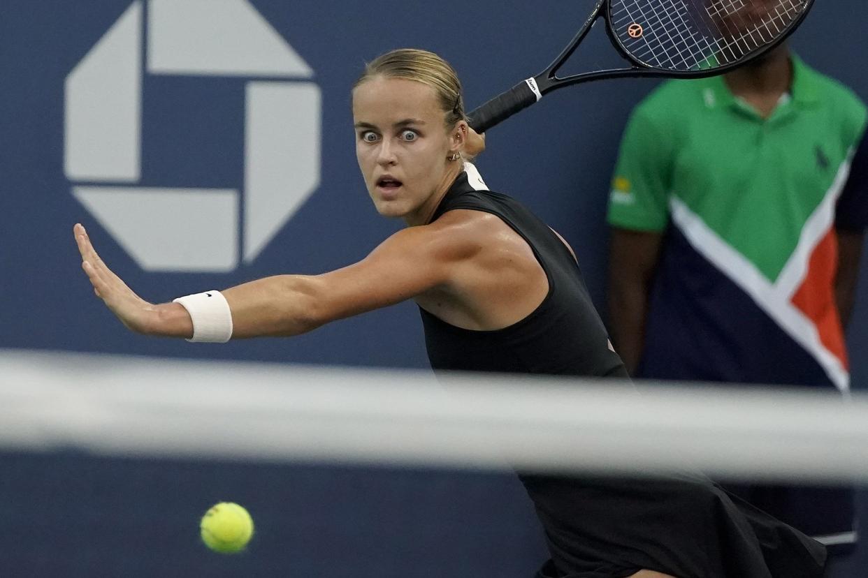 Anna Karolina Schmiedlova, of Slovakia, returns a shot to Nadia Podoroska, of Argentina during the first round of the U.S. Open tennis championship on Monday, Aug. 29, 2022, in New York.