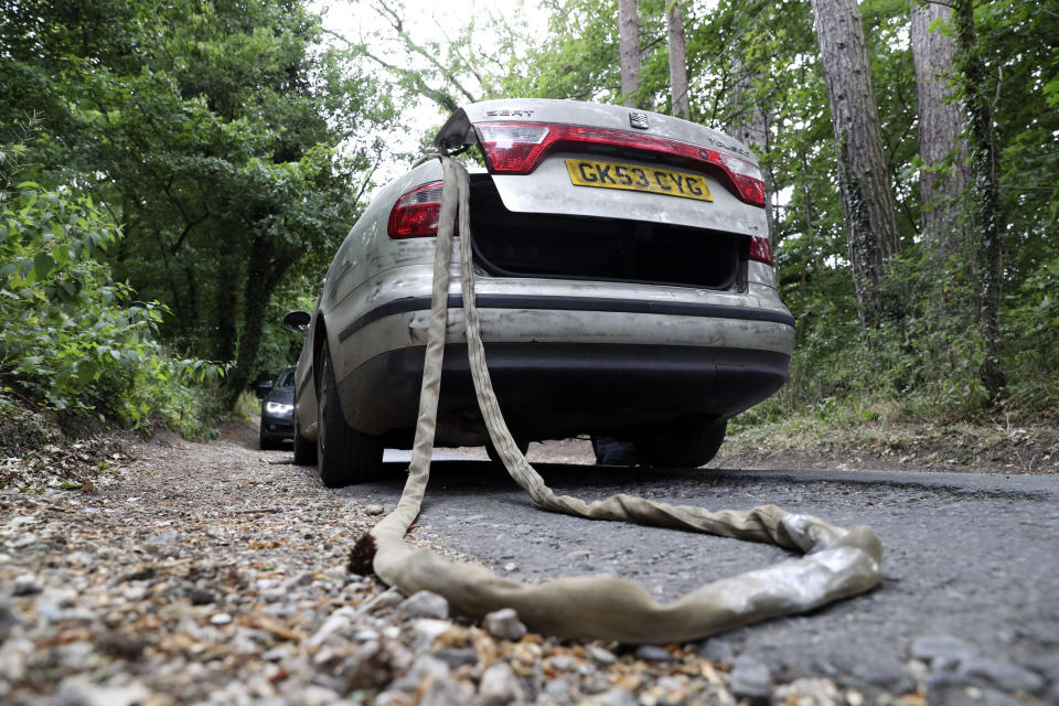 File photo dated 01/07/20 of the Seat Toledo with tow rope and the police car in a similar position at the site of the meeting of the vehicles during the Old Bailey jury site visit to scene in Sulhamstead, Berkshire where Pc Andrew Harper died. Driver Henry Long, 19, has been found not guilty at the Old Bailey of murder, but had earlier pleaded guilty to manslaughter. His passengers Jessie Cole and Albert Bowers, both 18, were cleared of murder but found guilty of manslaughter for the death of Pc Andrew Harper, who had been attempting to apprehend quad bike thieves when he was killed on the night of August 15, 2019.