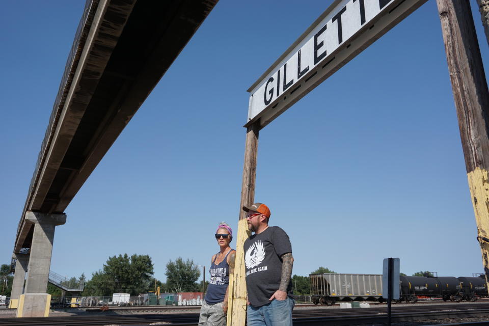 In this Thursday, Sept. 5, 2019 photo shows warehouse technician Melissa Worden, left, and heavy equipment operator Rory Wallet, in downtown Gillette, Wyo. The shutdown of Blackjewel LLC's Belle Ayr and Eagle Butte mines in Wyoming since July 1, 2019, has added yet more uncertainty to the Powder River Basin's struggling coal economy. Both Worden and Wallet wonder if they will get their old jobs back. (AP Photo/Mead Gruver)