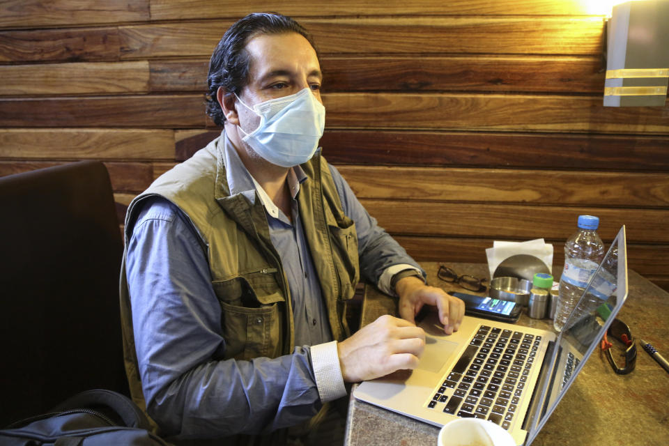 Dr. Amer Sattar, who worked in Guinea during the Ebola epidemic that began in 2014 and spread through West Africa ultimately killing more than 11,000 people over two years, speaks during an interview at his office in Conakry, Guinea on Tuesday, June 9, 2020. Sattar says the 2020 coronavirus crisis is a chance for international donors and governments alike to invest in the long term “so that we’re ready for the next pandemic.” (AP Photo/Youssouf Bah)