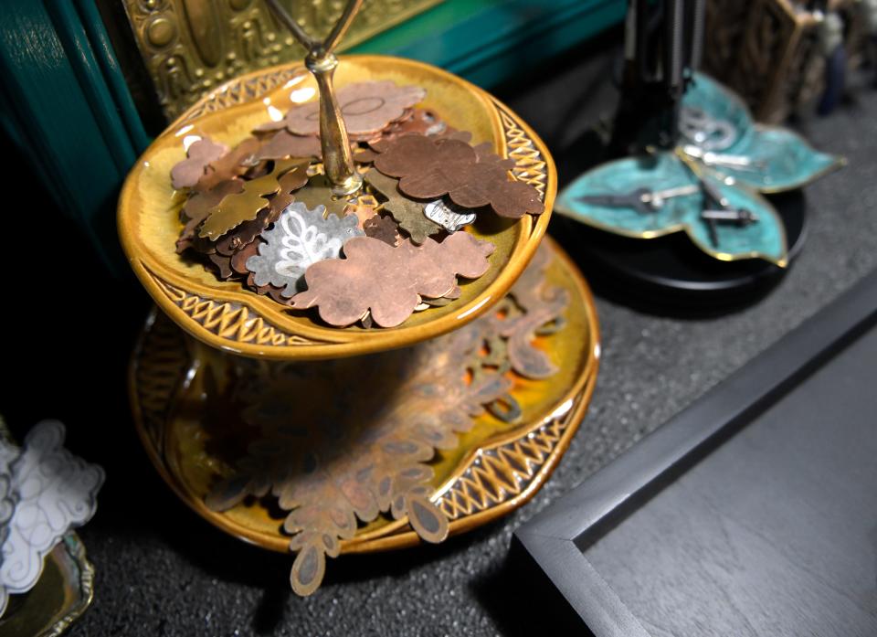 Dawna Gillespie discusses her copper and brass jewelry in her home studio, Wednesday, April 24, 2024, in Ransom Canyon.