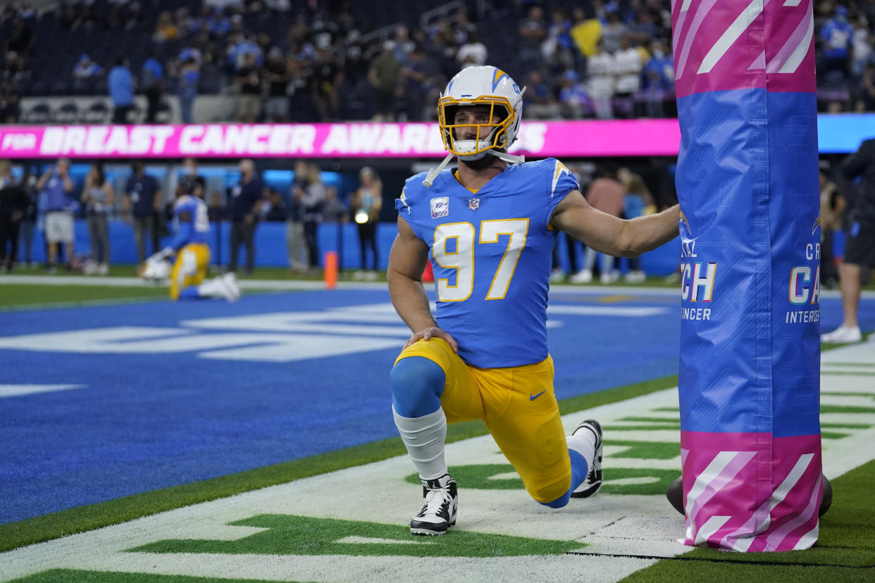 Los Angeles Chargers defensive end Joey Bosa warms up before Monday night's game. (AP Photo/Marcio Jose Sanchez)