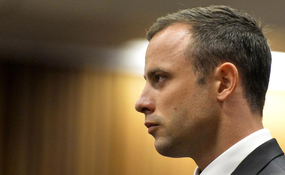 Pistorius stands in the dock during his trial at the North Gauteng High Court in Pretoria