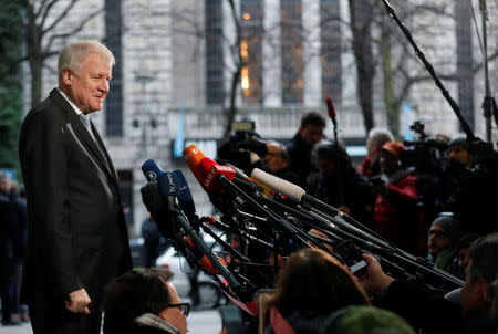 Leader of the Christian Social Union in Bavaria (CSU) Horst Seehofer delivers a statement before exploratory talks about forming a new coalition government at the SPD headquarters in Berlin, Germany, January 7, 2018. REUTERS/Hannibal Hanschke