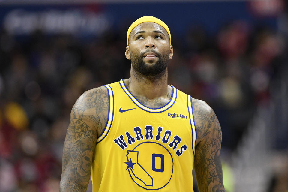 Sources told Yahoo Sports that a fan in Boston has been banned for racial slurs directed at DeMarcus Cousins. (AP)