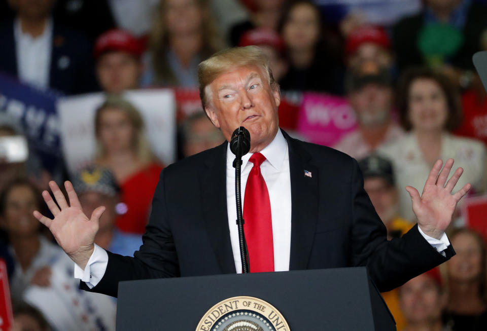 President Donald Trump speaks during a rally for Georgia Republican gubernatorial candidate Brian Kemp Sunday, Nov. 4, 2018, in Macon, Ga. (AP Photo/John Bazemore)