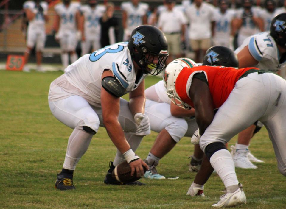 Ponte Vedra center Jake Guarnera (53) snaps the ball against Mandarin during the Aug. 18 kickoff classic.