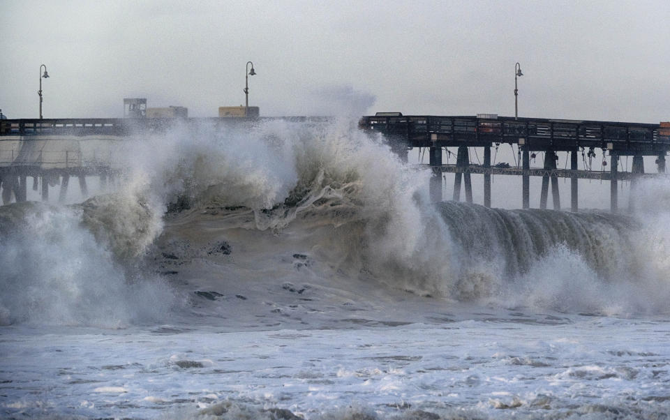 A very large wave breaks near the Ventura pier on Saturday, Dec. 30, 2023 in Ventura, Calif. Similar waves overran beaches elsewhere Thursday on the California coast, flooding parking lots, streets and triggering evacuation warnings for low-lying areas.ave energy across coastal waters. (AP Photo/Richard Vogel)