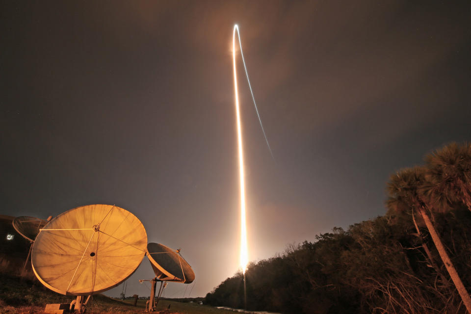 Vulcan Centaur launch showing a bright light through the sky.