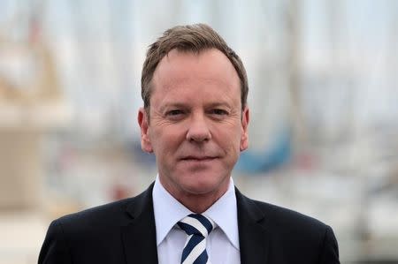 Actor Kiefer Sutherland poses during a photocall for the television series "Designated Survivor" during the annual MIPCOM television programme market in Cannes, France, October 17, 2016. REUTERS/Eric Gaillard